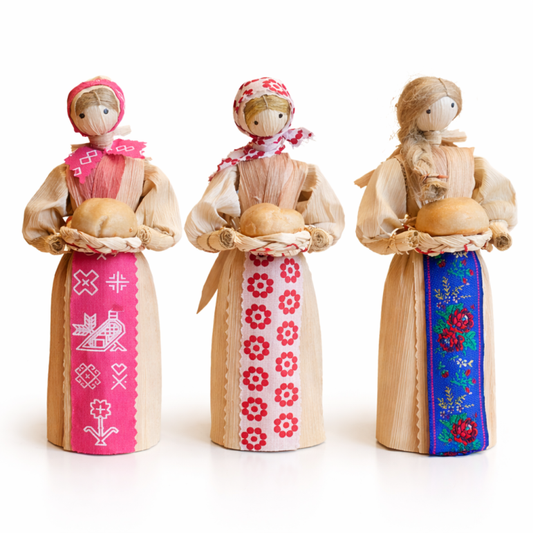 Corn husk doll with bread